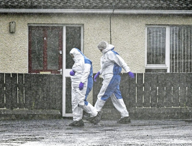 Forensic officers in McCrea Park in Clogher, CoTyrone. following the discovery of the body of Pat Ward in an alleyway. 