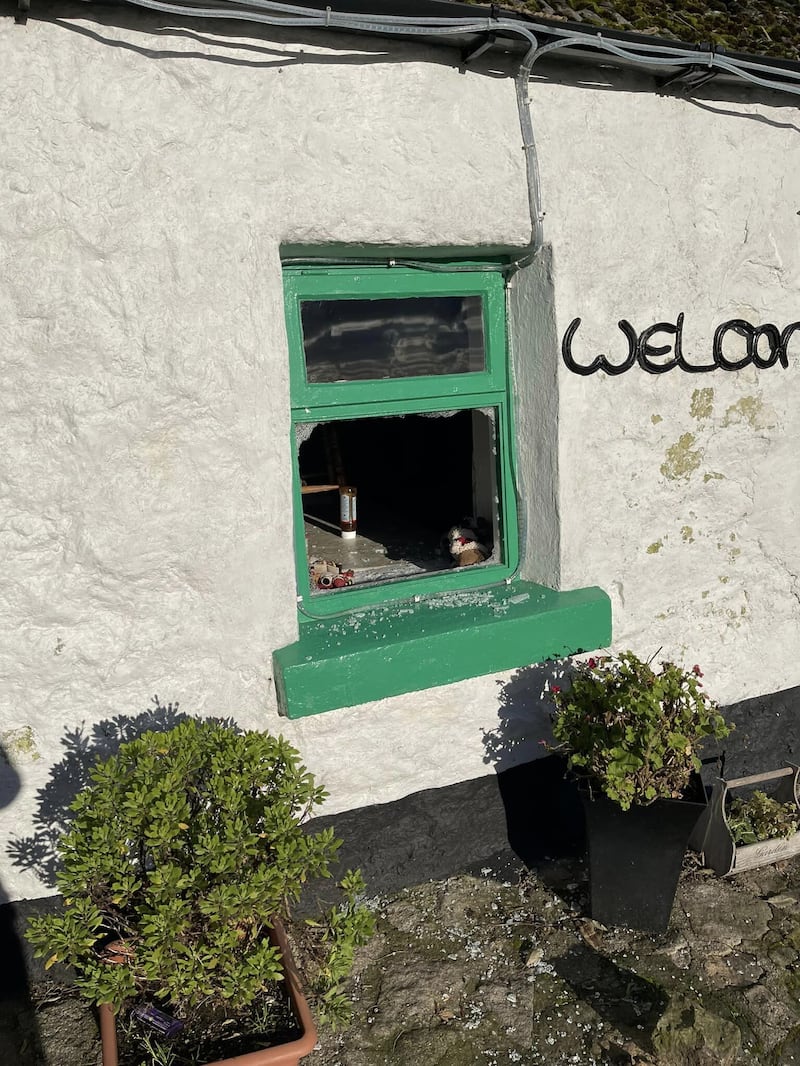 Damage caused to a window at the Carrick Cottage Café in Annalong.