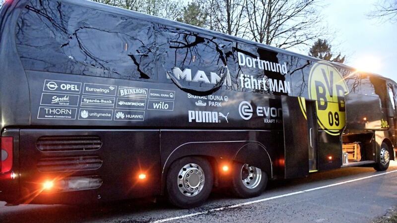 A window of Dortmund&#39;s team bus is damaged after an explosion before the Champions League quarter-final between Borussia Dortmund and AS Monaco in Dortmund 