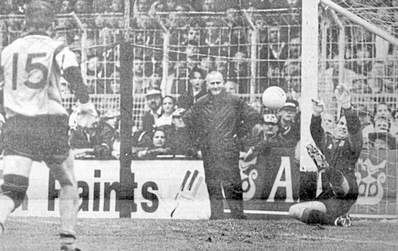 Down goalkeeper Neil Collins dives to his right to save Charlie Redmond&#39;s penalty in the closing stages of the 1994 All-Ireland final 