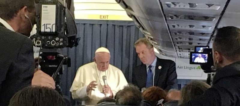 Pope Francis speaks to journalists on his flight back to Rome