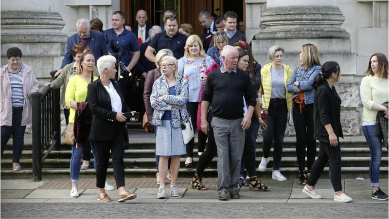 Relatives who are campaigning for inquests into the deaths of their loved ones leave the High Court in Belfast yesterday. Picture by Hugh Russell. 