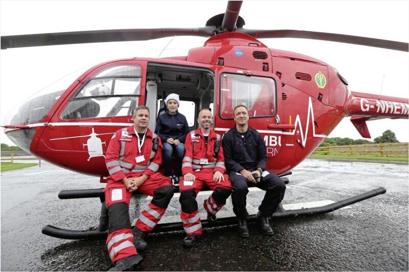 Conor McMullan (11) pictured with Dr Darren Monaghan, paramedic Glenn O&#39;Rorke and pilot David O&#39;Toole. Picture by Hugh Russell 