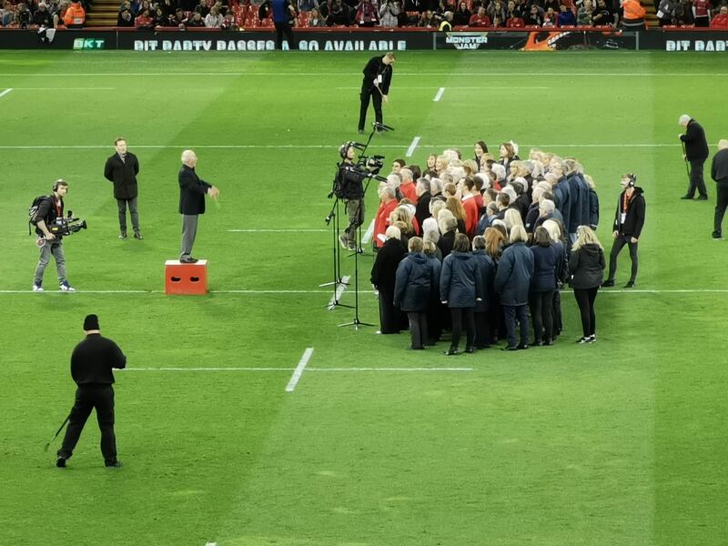 A zoom shot of the choir in the Principality Stadium, Cardiff