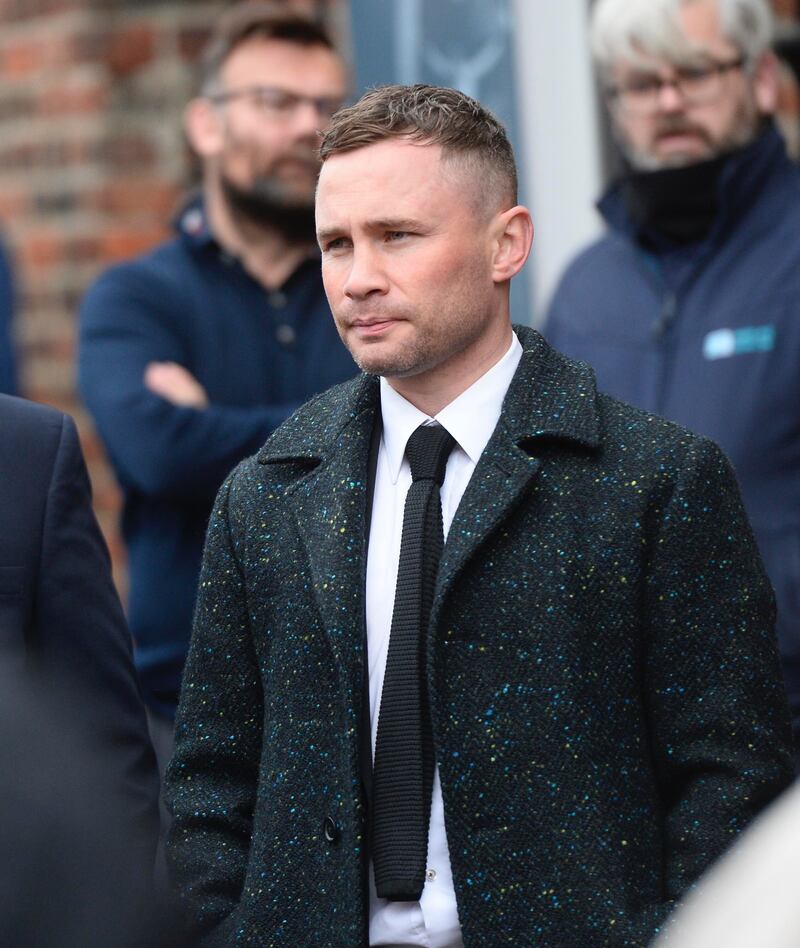 Boxer Carl Frampton attended the funeral with his wife Christine. Picture by Mark Marlow