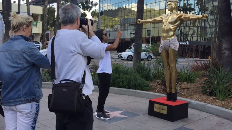Gold statue of Kanye West as Jesus unveiled by British artist in Hollywood