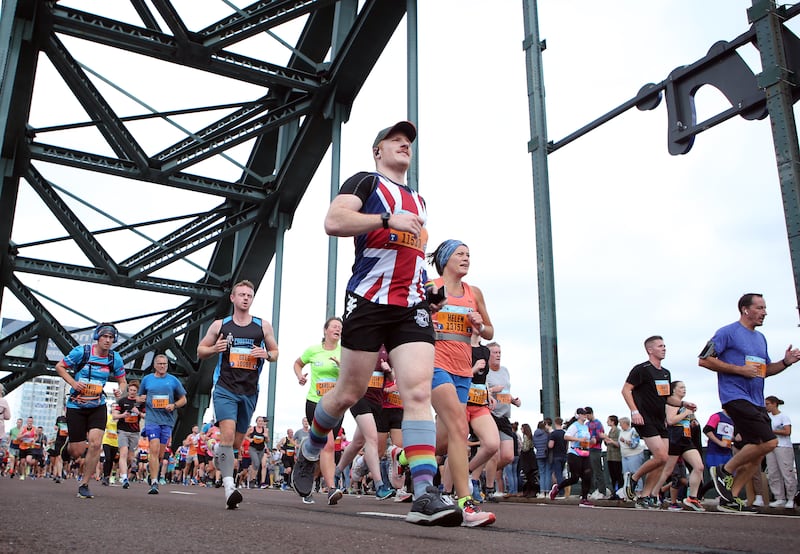 The Tyne Bridge, seen here with Great North Run competitors, is a symbol of Tyneside