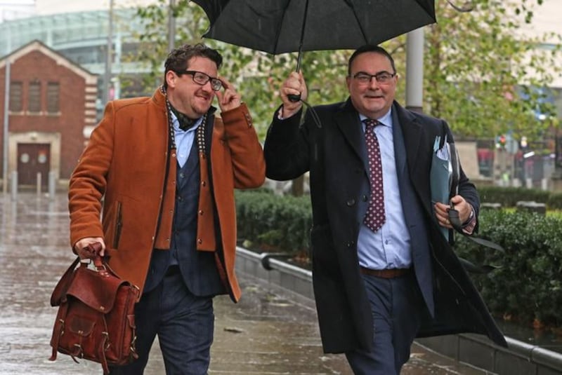&nbsp;Sean Napier (left) and his solicitor Paul Farrell arrive at the Royal Courts of Justice in Belfast for a hearing in his legal challenge against the DUP's boycott of cross-border political meetings.