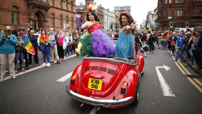 Thousands of people watched the Pride parade in Belfast city centre last year. Picture by AP/Peter Morrison 