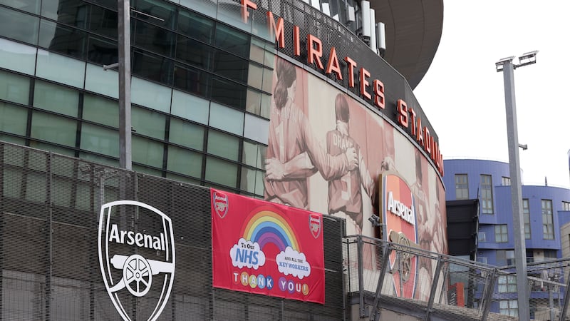 An NHS banner outside Emirates Stadium, home of Arsenal, during the Covid-affected 2019/20 Premier League season (Jonathan Brady/PA)