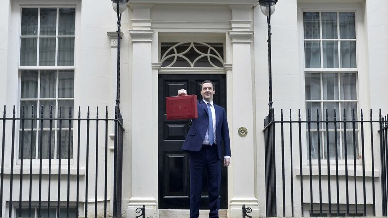 Chancellor George Osborne has just scheduled further cuts to the UK rate that will leave it not much higher than Ireland&rsquo;s by 2020. Picture by Hannah McKay, Press Association 