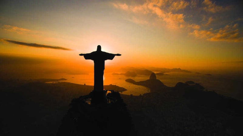 The sun rises behind the Christ the Redeemer statue, above the Guanabara bay in Rio de Janeiro. Picture by Felipe Dana, AP&nbsp;