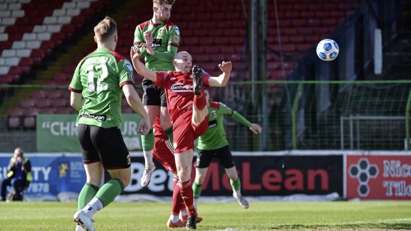 Glentoran&#39;s Ruaidhr&iacute; Donnelly heads home during Saturday&#39;s win at the Oval Picture by Colm Lenaghan/Pacemaker 