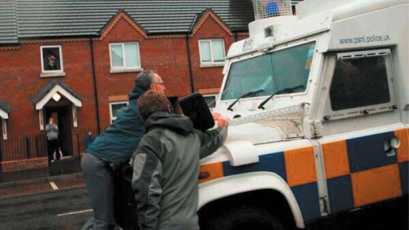 &nbsp;In 2013, the North Belfast MLA was carried on the bonnet of a PSNI Land Rover for several yards after trying to speak to officers about the arrest of a 16-year-old following a loyalist parade.