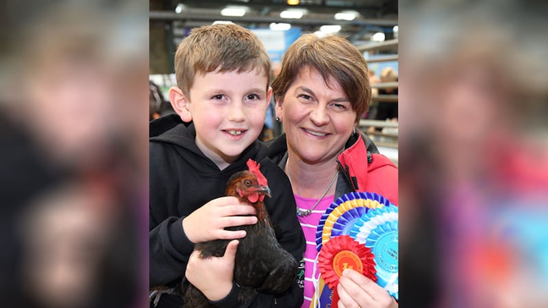 First Minister Arlene Foster and son Ben pictured at the Fermanagh County Show in August with prize-winning hen Rosie. Picture by Cliff Donaldson