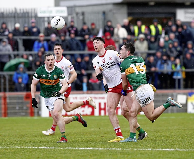 Tyrone&#39;s Joe Oguz and Kerry&#39;s Paul Murphy and Paudie Clifford in action at Healy Park. Pic Philip Walsh. 