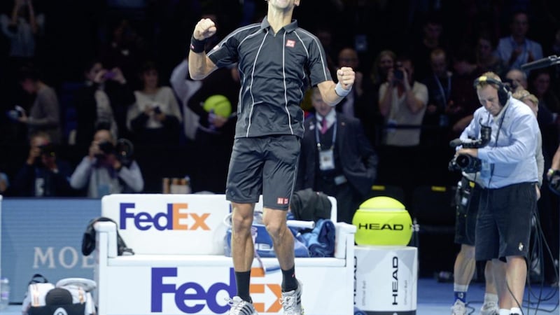 Serbia&#39;s Novak Djokovic celebrates defeating Spain&#39;s Rafael Nadal at the Barclays ATP World Tour Finals at the O2 Arena London on Monday November 11 2013. Picture by Adam Davy/PA Wire. 