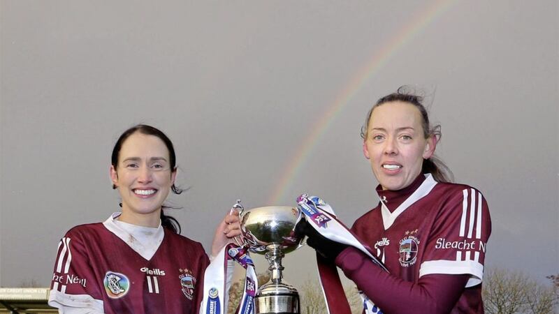 A rainbow appears across the Glenshane Pass as Slaughtneil captains Tina Bradley and Louise Dougan lift the cup after the team beat Loughgiel during the Ulster Senior Camogie Club Championship Final 2020 replay at Glen Maghera on Saturday 4th December 2021. Picture Margaret McLaughlin. 