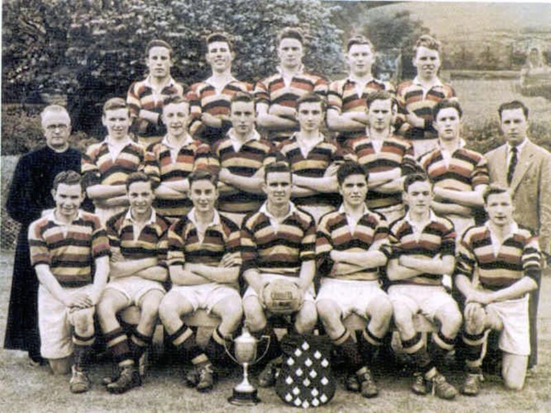 The Abbey CBS team that made history by winning the MacRory Cup in 1954. Gerry Butterfield is pictured holding the ball in the front row 