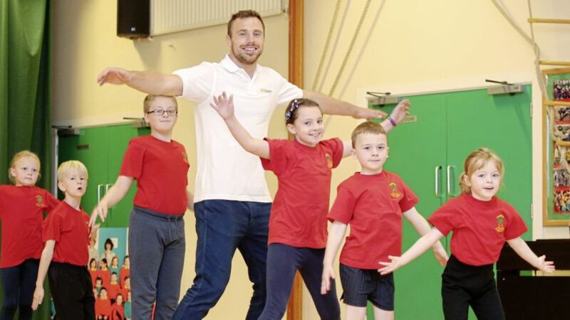 Irish International rugby star Tommy Bowe pictured with Emme Bell, Ryan Jackson, Pearse Duffy, Rosie O&#39;Reilly, Elle Canavan-Rowan and Lukas Wilkinson of Oakwood Integrated Primary School, Dunmurry, at the launch of Subway&#39;s two-year sponsorship of Sports for Schools Picture: Jonathan Porter/PressEye.com 