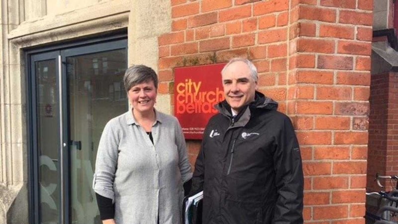 Community affairs officer Stephen Jones with Joan Vaughan, Holylands resident and operations manager of City Church 