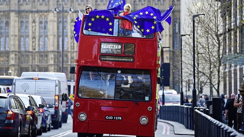 Remain supporters on board an open top bus outside Westminster. Picture by Victoria Jones/PA Wire 