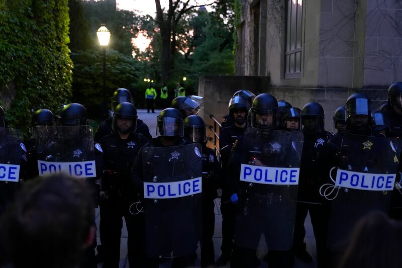 Police block protesters (Charles Rex Arbogast/AP)