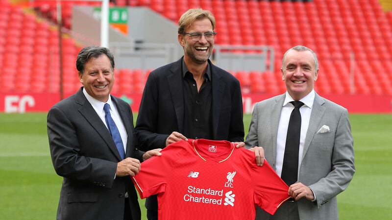 New Liverpool manager Jurgen&nbsp;Klopp&nbsp;(centre) with club CEO Ian Ayre (right) and chairman Tom Werner (left)&nbsp;