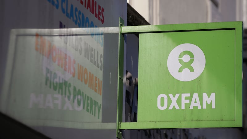 An Oxfam shop sign in London (Yui Mok/PA)