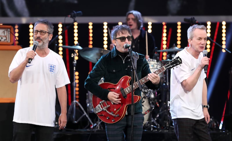 Ian Broudie of the Lightning Seeds performs with David Baddiel and Frank Skinner during the BBC Sports Personality of the Year 2018 at Birmingham Genting Arena