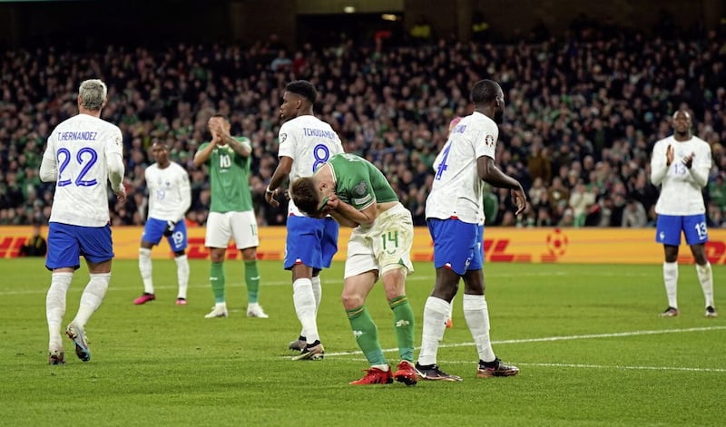 Ireland&#39;s players disconsolate after Pavard scores against them back in March 
