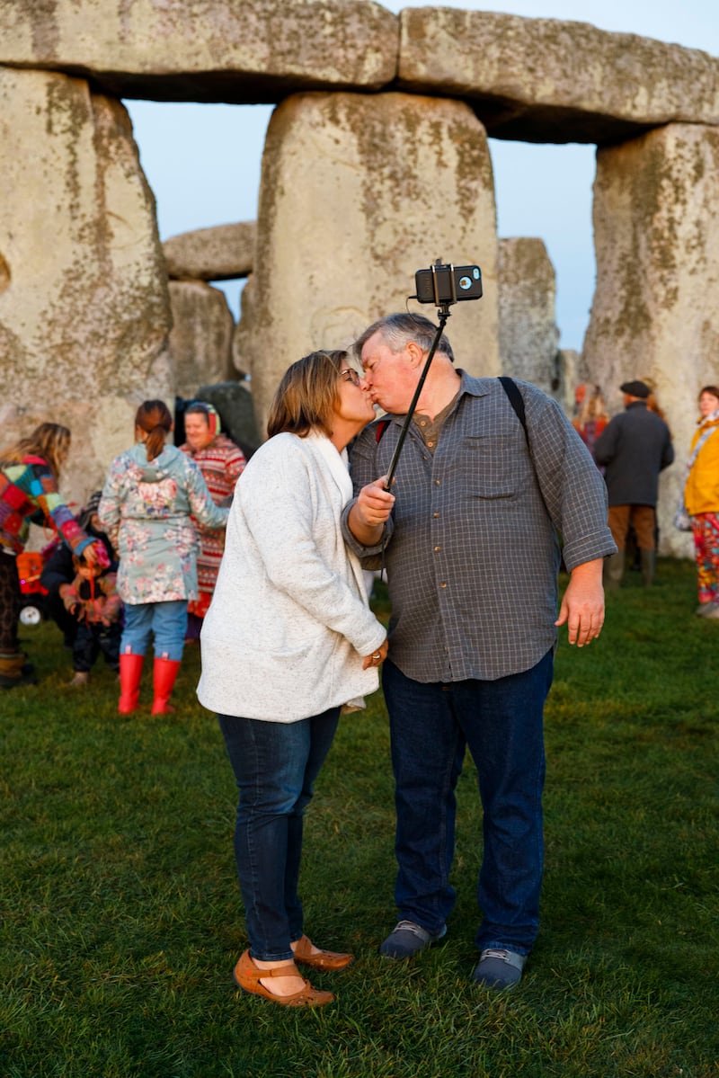 Martin Parr took a photograph of a couple kissing while taking a selfie