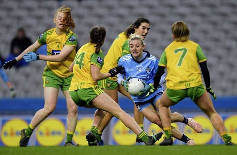 Nicole Owens of Dublin is surrounded by Donegal players, from left, Megan Ryan, Evelyn McGinley, Emer Gallagher, and Niamh Carr during the Lidl Ladies NFL Division 1 Round 1 match at Croke Park in Dublin on February 2 2019. Picture by Piaras &Oacute; M&iacute;dheach/Sportsfile 