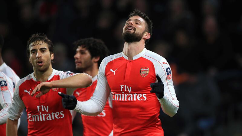 Arsenal's Olivier Giroud celebrates after opening the scoring during Tuesday's FA Cup fifth round replay against Hull at the KC Stadium<br />Picture by PA&nbsp;