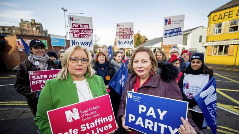 Royal College of Nursing director Pat Cullen (left) with Royal Belfast Hospital for Sick Children ward sister Ann McDonald on the picket line last month. 