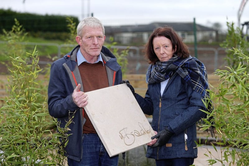 Matthew Bradley's parents Donal and Margaret at a community garden in Glenavy which includes a memorial to their son. Picture by Mal McCann