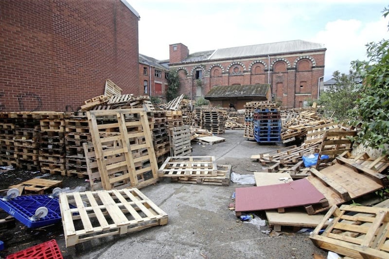 Material is also being stored on land beside the former Gilpin&#39;s furniture store in Sandy Row. Picture by Mal McCann 