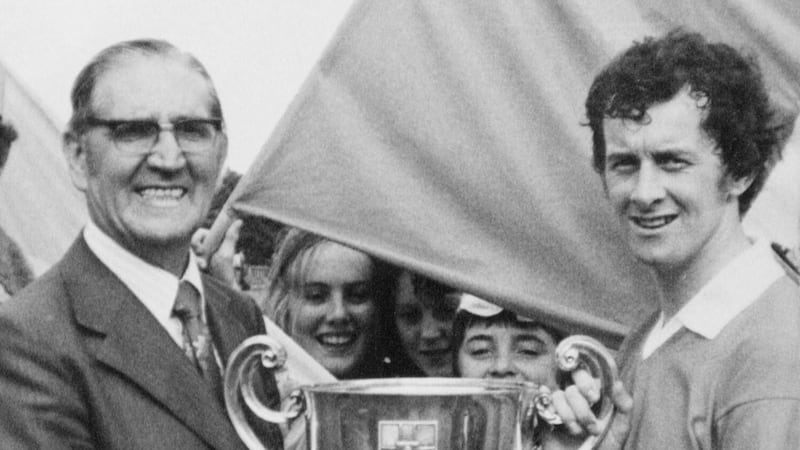 Jimmy Smyth recieves the Anglo-Celt Cup on the pitch at Clones after the 1977 Ulster final