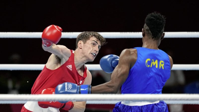 Ireland's Aidan Walsh (left) in action against Cameroon's Albert Eashash Ayissi during their Men's Welter (63-69kg) Preliminary bout at Kokugikan Arena on the fourth day of the Tokyo 2020 Olympic Games in Japan. Martin Rickett/PA Wire.&nbsp;