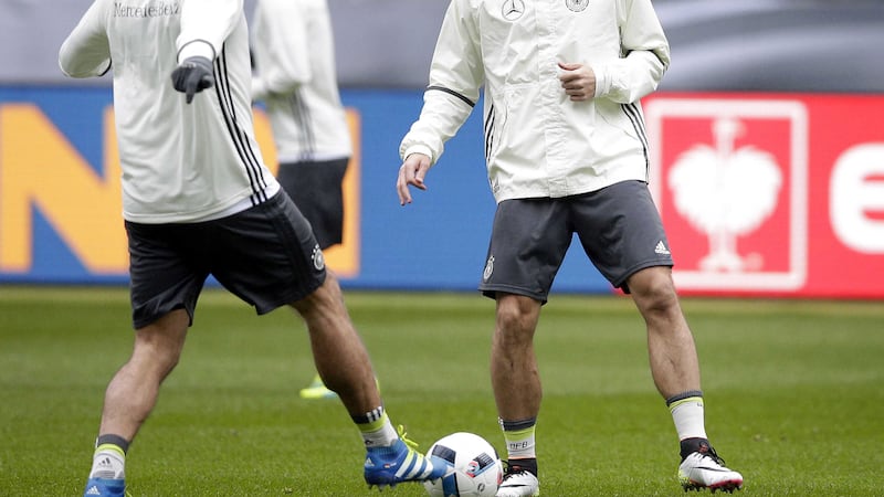 Germany's Mario Gomes and Mats Hummels during a training session in Berlin on Friday<br />Picture by AP&nbsp;