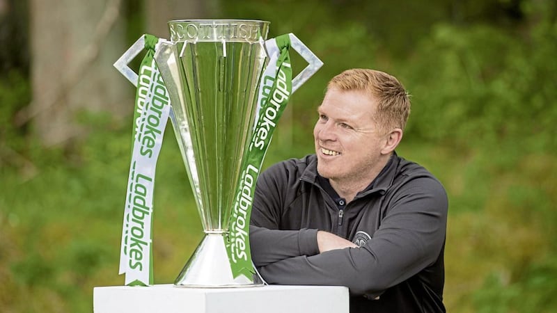 Celtic manager Neil Lennon with the Scottish Premiership trophy after Celtic were crowned champions for the ninth season in a row in April. 