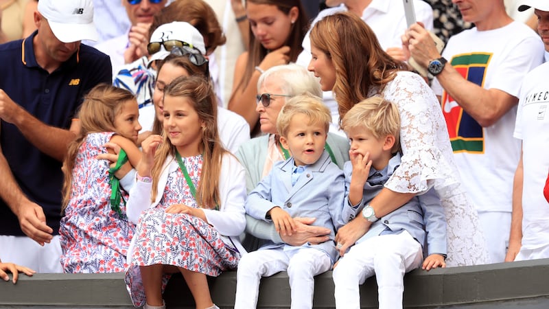 The tennis legend fought back tears as he saw his adorable children watching on.