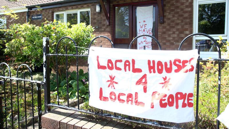 Residents held a protest outside a Nigerian man&#39;s home in east Belfast last year 