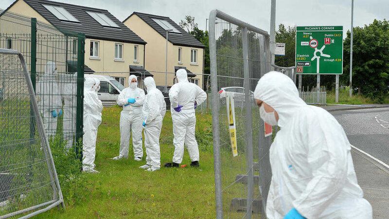 Police forensic experts examine the scene after a suspected assault in Newry. Picture by Justin Kernoghan, Photopress 