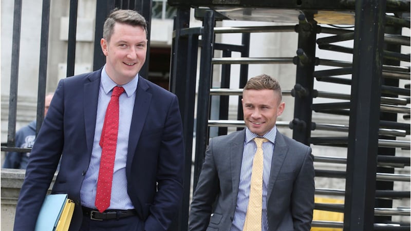 Boxer Carl Frampton (right) leaves the High Court in Belfast with solicitor John Finucane earlier this week. Picture by Hugh Russell&nbsp;
