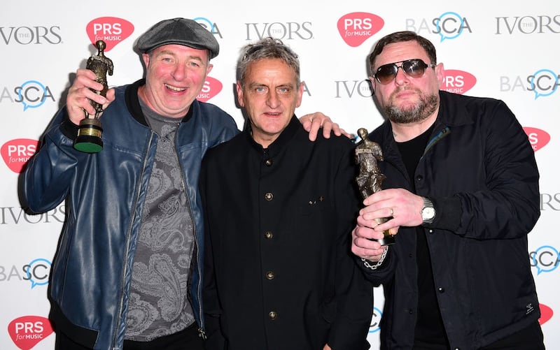 Mark Day, Paul Ryder and Shaun Ryder of The Happy Mondays with the Inspiration Award during the 61st Annual Ivor Novello Music Awards at Grosvenor House in London in 2016