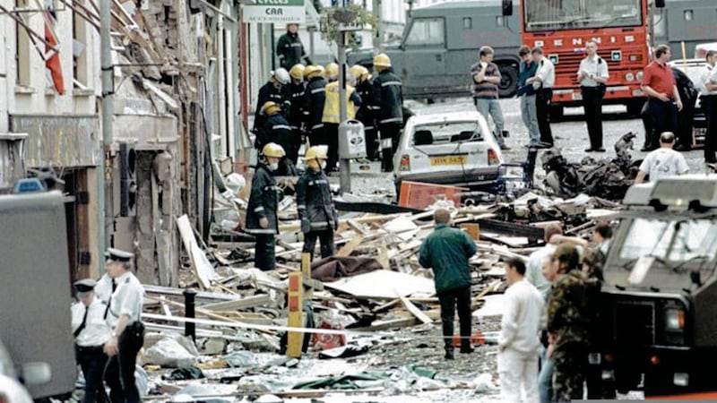 Rescue workers and police search for survivors following following the Omagh bombing. Picture by  Alan Lewis, Photopress