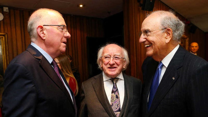 Charlie Flanagan TD, President Micheal D Higgins and US Senator George Mitchell at the Abbey Theatre, Dublin on the 18th Anniversary of the Good Friday Agreement 