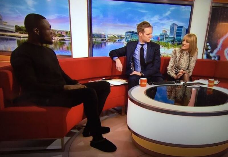 A grab of Stormzy on BBC Breakfast wearing his slippers