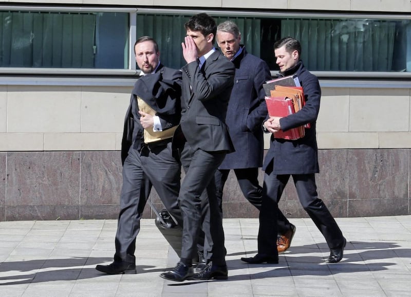 Blane McIlroy leaves court after being found not guilty Picture Mal McCann. 